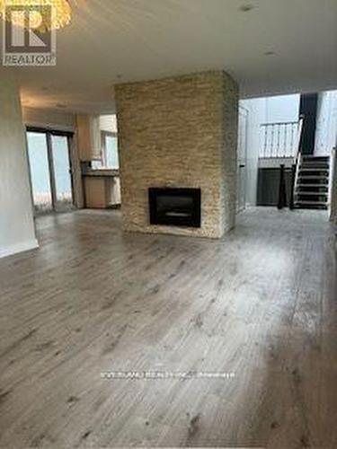 98 Rathburn Road, Toronto, ON - Indoor Photo Showing Other Room With Fireplace