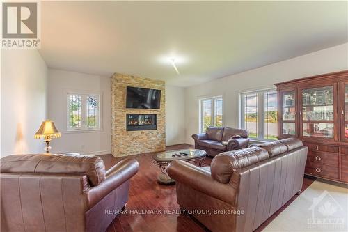 800 Old Highway 17 Road, Prescott And Russell, ON - Indoor Photo Showing Living Room With Fireplace