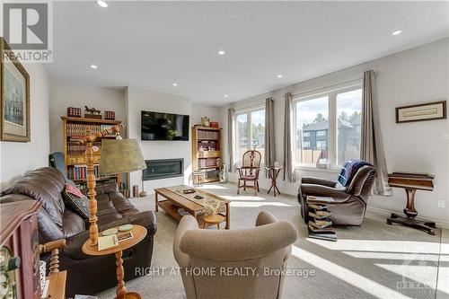 527 Albert Boyd, Ottawa, ON - Indoor Photo Showing Living Room With Fireplace