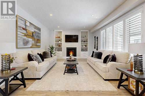 370 Masters Drive, Woodstock, ON - Indoor Photo Showing Living Room With Fireplace