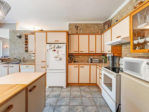 Kitchen - 3468 Ch. Hopps, Austin, QC - Indoor Photo Showing Kitchen With Double Sink