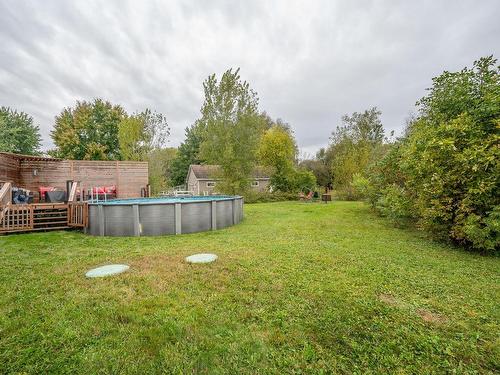 Back facade - 2596 Route 219, Saint-Jean-Sur-Richelieu, QC - Outdoor With Above Ground Pool With Backyard