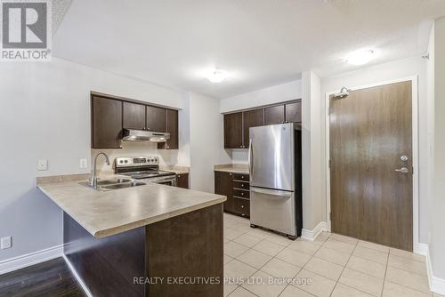 103 - 3070 Rotary Way, Burlington, ON - Indoor Photo Showing Kitchen With Double Sink