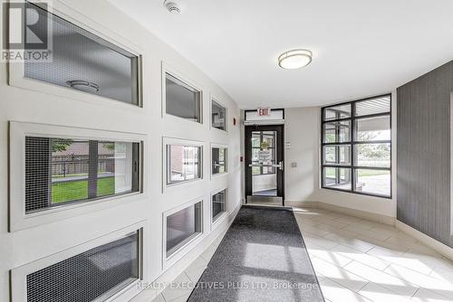 103 - 3070 Rotary Way, Burlington, ON - Indoor Photo Showing Other Room With Fireplace