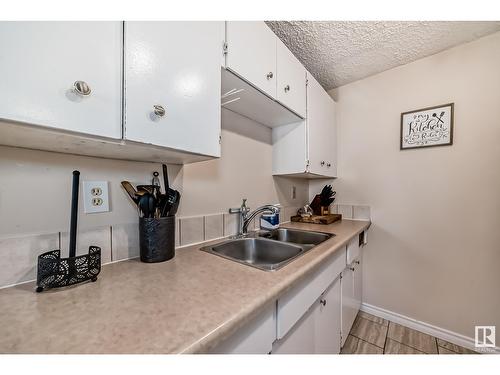 9E Clareview Vg Nw, Edmonton, AB - Indoor Photo Showing Kitchen With Double Sink