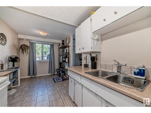 9E Clareview Vg Nw, Edmonton, AB - Indoor Photo Showing Kitchen With Double Sink