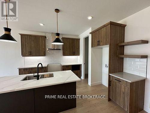 49 - 14 Coastal Crescent, Lambton Shores (Grand Bend), ON - Indoor Photo Showing Kitchen