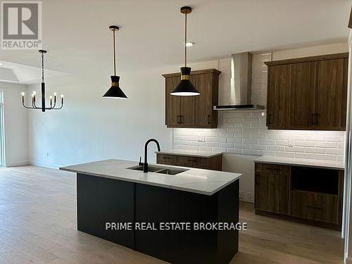 49 - 14 Coastal Crescent, Lambton Shores (Grand Bend), ON - Indoor Photo Showing Kitchen With Double Sink