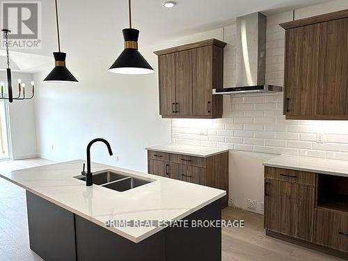 49 - 14 Coastal Crescent, Lambton Shores (Grand Bend), ON - Indoor Photo Showing Kitchen With Double Sink