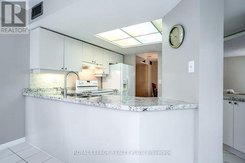 211 - 45 Kingsbridge Garden Circle, Mississauga, ON - Indoor Photo Showing Kitchen