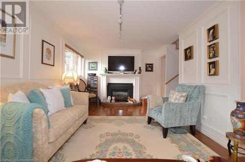 1564 Kerns Road Unit# 1, Burlington, ON - Indoor Photo Showing Living Room With Fireplace