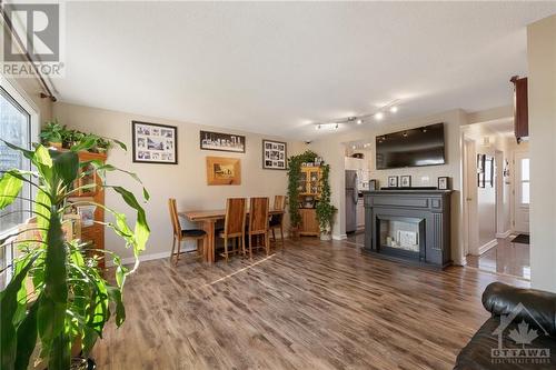 1464 Murdock Gate, Ottawa, ON - Indoor With Fireplace