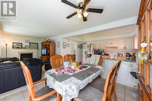 107 Seclusion Crescent, Brampton, ON - Indoor Photo Showing Dining Room With Fireplace