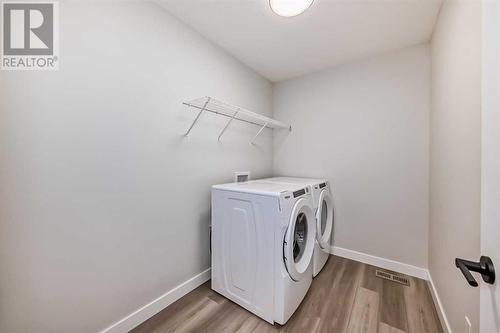 336 Beltmont Park Sw, Calgary, AB - Indoor Photo Showing Laundry Room