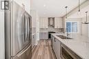 336 Beltmont Park Sw, Calgary, AB  - Indoor Photo Showing Kitchen With Stainless Steel Kitchen With Double Sink With Upgraded Kitchen 