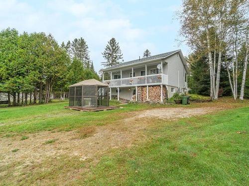 ExtÃ©rieur - 1091 Ch. Du Lac-Paquet E., Rivière-Rouge, QC - Outdoor With Deck Patio Veranda