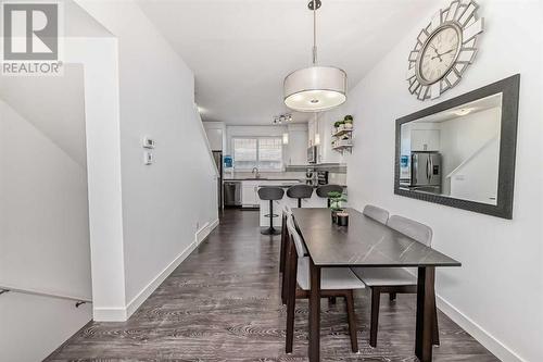 Open Concept Kitchen, Dining, and Living Area - 109 Evanston Manor Nw, Calgary, AB - Indoor Photo Showing Dining Room