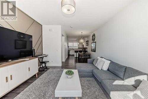 Open Concept Kitchen, Dining, and Living Area - 109 Evanston Manor Nw, Calgary, AB - Indoor Photo Showing Living Room