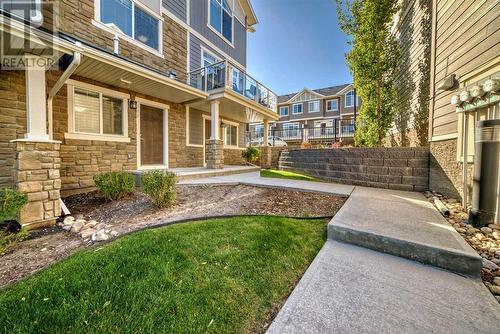 Low maintenance complex - 109 Evanston Manor Nw, Calgary, AB - Outdoor With Balcony With Facade