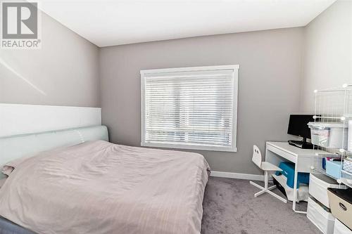 Second bedroom upstairs - 109 Evanston Manor Nw, Calgary, AB - Indoor Photo Showing Bedroom