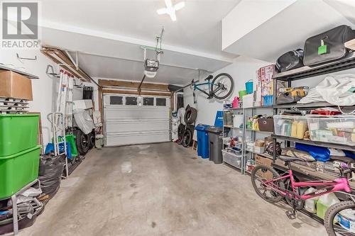 Insulated single attached garage - 109 Evanston Manor Nw, Calgary, AB - Indoor Photo Showing Garage