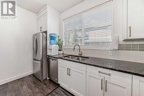 109 Evanston Manor Nw, Calgary, AB - Indoor Photo Showing Kitchen With Double Sink