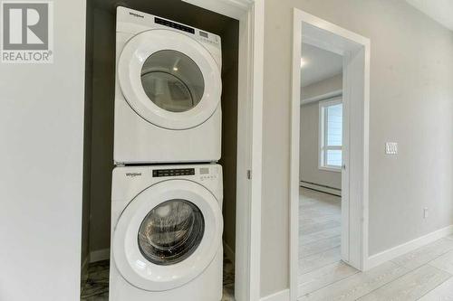 2221, 60 Skyview Ranch Road Ne, Calgary, AB - Indoor Photo Showing Laundry Room