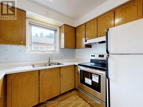 26 Roywood Drive, Toronto, ON - Indoor Photo Showing Kitchen With Double Sink