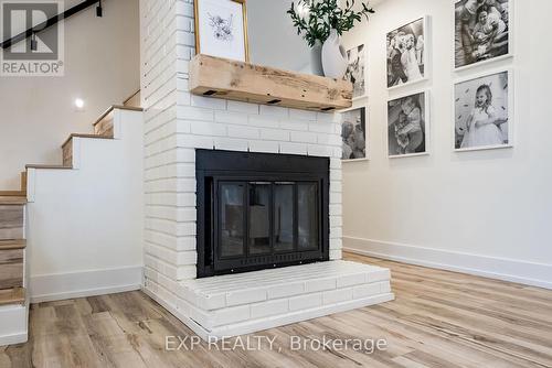 7 Lambs Lane, Clarington (Bowmanville), ON - Indoor Photo Showing Living Room With Fireplace