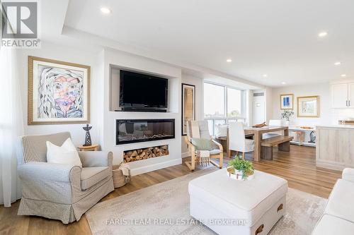 516 - 172 Eighth Street, Collingwood, ON - Indoor Photo Showing Living Room With Fireplace