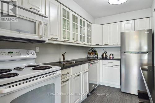 604 - 1110 Walden Circle, Mississauga, ON - Indoor Photo Showing Kitchen With Double Sink