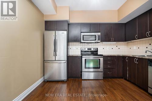 218 - 5 Richgrove Drive, Toronto, ON - Indoor Photo Showing Kitchen With Stainless Steel Kitchen