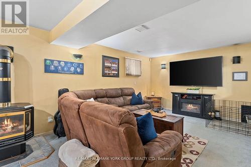 181 Moores Beach Road, Georgina, ON - Indoor Photo Showing Living Room With Fireplace