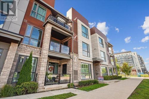 105 - 2388 Khalsa Gate, Oakville, ON - Outdoor With Balcony With Facade