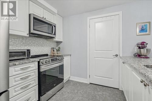 105 - 2388 Khalsa Gate, Oakville, ON - Indoor Photo Showing Kitchen