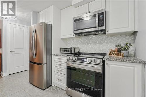 105 - 2388 Khalsa Gate, Oakville, ON - Indoor Photo Showing Kitchen With Stainless Steel Kitchen