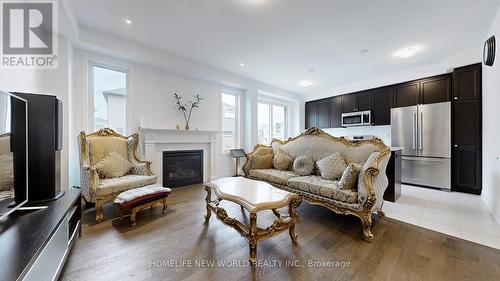 1911 Narcissus Gardens, Pickering, ON - Indoor Photo Showing Living Room With Fireplace