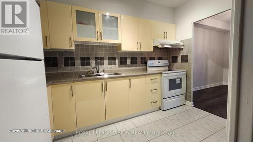 Ph02 - 1 Massey Square, Toronto, ON - Indoor Photo Showing Kitchen With Double Sink