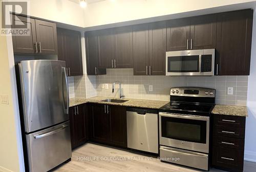 908 - 7167 Yonge Street, Markham, ON - Indoor Photo Showing Kitchen With Upgraded Kitchen