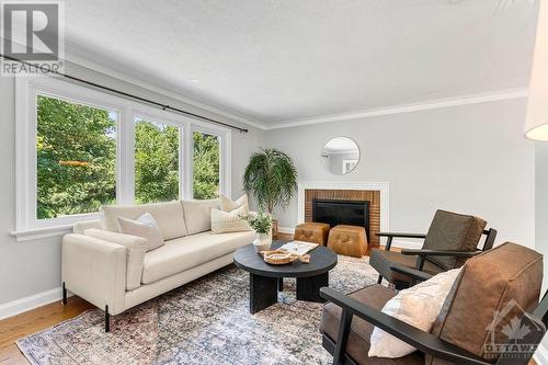 446 Thessaly Circle, Ottawa, ON - Indoor Photo Showing Living Room With Fireplace