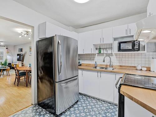 391 Kingston Rd, Toronto, ON - Indoor Photo Showing Kitchen With Double Sink