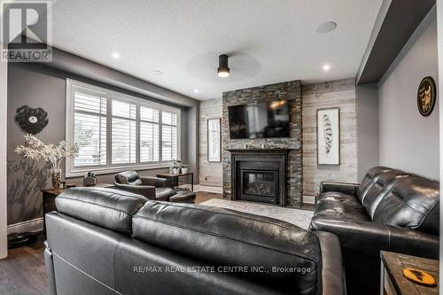 419 Dolman Street, Woolwich, ON - Indoor Photo Showing Living Room With Fireplace