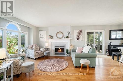 148 Charles Street, Arnprior, ON - Indoor Photo Showing Living Room With Fireplace