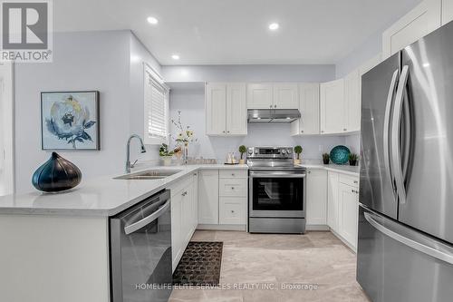 3 Lenthall Avenue, Toronto, ON - Indoor Photo Showing Kitchen With Stainless Steel Kitchen With Double Sink