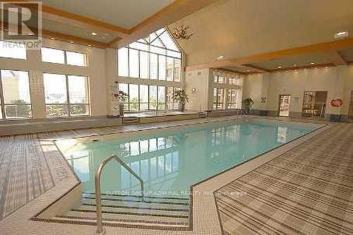 1404 - 4080 Living Arts Drive, Mississauga, ON - Indoor Photo Showing Other Room With In Ground Pool