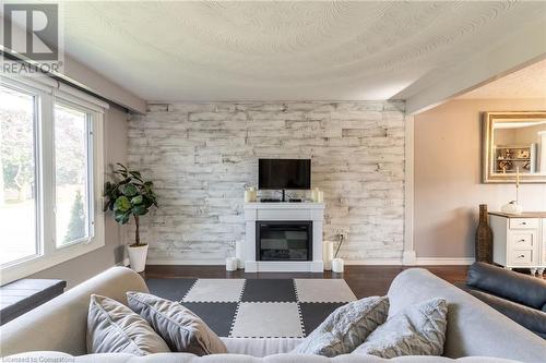 59 Regent Avenue, Hamilton, ON - Indoor Photo Showing Living Room With Fireplace