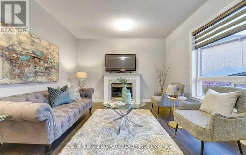 11 Canarygrass Drive, Brampton, ON - Indoor Photo Showing Living Room With Fireplace