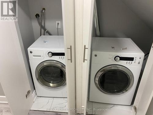 Bsmt - 14 Hashmi Place, Brampton, ON - Indoor Photo Showing Laundry Room