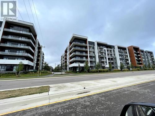 329 - 128 Grovewood Common, Oakville, ON - Outdoor With Facade