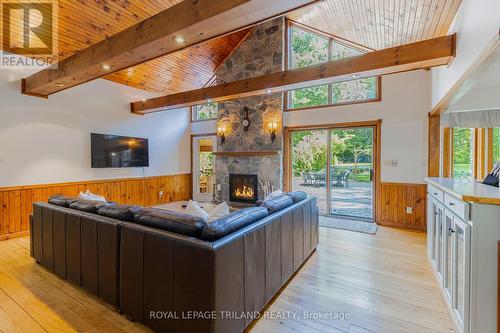 10342 Beach O' Pines Road, Lambton Shores (Grand Bend), ON - Indoor Photo Showing Living Room With Fireplace